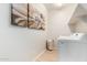 Laundry room with washer and dryer, and wall art at 18252 W Cielo Grande Ave, Surprise, AZ 85387