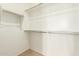 Large walk-in closet with double hanging rods at 18252 W Cielo Grande Ave, Surprise, AZ 85387