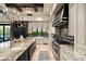 Bright kitchen features granite countertops, stainless steel appliances, and a center island at 19481 N 98Th Pl, Scottsdale, AZ 85255