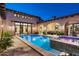 Expansive pool and spa with adjacent patio and seating area at 19481 N 98Th Pl, Scottsdale, AZ 85255