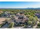 Aerial view of a beautiful home nestled in a desirable neighborhood at 19481 N 98Th Pl, Scottsdale, AZ 85255