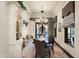 Elegant dining room with built-in window seat and access to backyard at 19481 N 98Th Pl, Scottsdale, AZ 85255