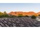 Aerial view showcasing mountain views and rooftops at 19481 N 98Th Pl, Scottsdale, AZ 85255