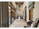 Grand entryway with high ceilings, tile floors, and natural light at 19481 N 98Th Pl, Scottsdale, AZ 85255