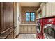 Convenient laundry room with washer, dryer, and ample counter space at 19481 N 98Th Pl, Scottsdale, AZ 85255