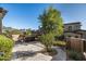 Landscaped patio with fire pit and seating area at 19481 N 98Th Pl, Scottsdale, AZ 85255