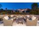 Cozy seating area with fireplace and views of the neighborhood at 19481 N 98Th Pl, Scottsdale, AZ 85255