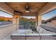 Rooftop deck features a sectional sofa and mountain views at 19481 N 98Th Pl, Scottsdale, AZ 85255