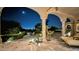 Elegant patio with city views, comfortable lounge chairs, and a dining area at 4836 E White Gates Dr, Phoenix, AZ 85018