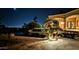 Night view of a luxurious pool and patio area at 4836 E White Gates Dr, Phoenix, AZ 85018
