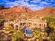 Luxury estate home with pool and mountain backdrop at 4836 E White Gates Dr, Phoenix, AZ 85018