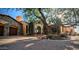Tuscan-style home with stone facade and circular driveway at 4836 E White Gates Dr, Phoenix, AZ 85018