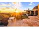 Elegant patio with seating area and sunset view at 4836 E White Gates Dr, Phoenix, AZ 85018