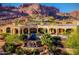 Luxury home with a large pool and waterfall at 4836 E White Gates Dr, Phoenix, AZ 85018