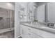Modern bathroom with double sinks and a large shower at 23680 N 168Th Ln, Surprise, AZ 85387