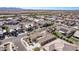 Aerial view of a residential neighborhood with houses and landscaping at 23680 N 168Th Ln, Surprise, AZ 85387
