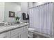Bathroom with granite countertop and bathtub at 23680 N 168Th Ln, Surprise, AZ 85387