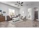 Living room with tiled floors and access to bedroom and bathroom at 23680 N 168Th Ln, Surprise, AZ 85387