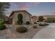 Single-story home with landscaped front yard and two-car garage at 23680 N 168Th Ln, Surprise, AZ 85387