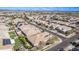 Aerial view of a residential neighborhood with houses and landscaping at 23680 N 168Th Ln, Surprise, AZ 85387