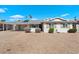 Single story home with brick facade and spacious front yard at 3826 W Myrtle Ave, Phoenix, AZ 85051