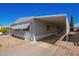 Exterior view of manufactured home with carport at 2650 W Union Hills Dr # 258, Phoenix, AZ 85027