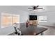 Bright dining area with a large wooden table and seating for four at 2650 W Union Hills Dr # 258, Phoenix, AZ 85027