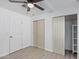 Bright bedroom with double closets and ceiling fan at 2650 W Union Hills Dr # 258, Phoenix, AZ 85027