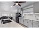 Modern kitchen with gray cabinets and a large island at 2650 W Union Hills Dr # 258, Phoenix, AZ 85027