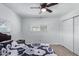 Bedroom with double bed, closet, and ceiling fan at 2650 W Union Hills Dr # 258, Phoenix, AZ 85027