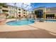 Inviting resort-style pool with a spa and comfortable seating areas at 18416 N Cave Creek Rd # 1027, Phoenix, AZ 85032