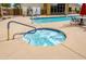 Relaxing hot tub with surrounding patio furniture at 18416 N Cave Creek Rd # 1027, Phoenix, AZ 85032