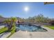 Stunning kidney-shaped pool with surrounding landscaping at 4349 E Smokehouse E Trl, Cave Creek, AZ 85331