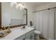 Bathroom with teal vanity, white countertop, and shower/tub at 4349 E Smokehouse E Trl, Cave Creek, AZ 85331