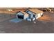 New construction home with a two-car garage and desert landscaping at 37179 W Illini St, Tonopah, AZ 85354