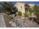 Landscaped front yard with desert landscaping and large rocks at 26678 W Tonopah Dr, Buckeye, AZ 85396