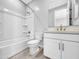 Clean bathroom with a tub shower combo, toilet, and vanity at 5616 W Paseo Way, Laveen, AZ 85339