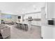 Open concept kitchen with island seating and stainless steel appliances at 5616 W Paseo Way, Laveen, AZ 85339