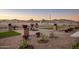 Landscaped front yard with attractive stonework and desert plants at 28847 N Royce Rd, San Tan Valley, AZ 85144