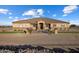 House exterior showcasing a Spanish-style design and landscaping at 28847 N Royce Rd, San Tan Valley, AZ 85144