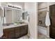 Bathroom boasts double vanity, shower, and tile flooring at 28847 N Royce Rd, San Tan Valley, AZ 85144