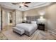 Bright main bedroom with plush bedding and ensuite bathroom access at 28847 N Royce Rd, San Tan Valley, AZ 85144