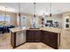 Spacious kitchen with granite countertops and stainless steel appliances at 28847 N Royce Rd, San Tan Valley, AZ 85144