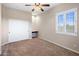 Bedroom includes built-in desk and closet at 28847 N Royce Rd, San Tan Valley, AZ 85144