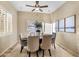 Formal dining room with seating for six and neutral decor at 28847 N Royce Rd, San Tan Valley, AZ 85144