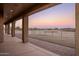 Covered patio overlooking a fenced equestrian arena at 28847 N Royce Rd, San Tan Valley, AZ 85144