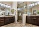 Elegant bathroom with double vanity and large glass shower at 28847 N Royce Rd, San Tan Valley, AZ 85144