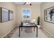 Home office features hardwood floors and large window at 28847 N Royce Rd, San Tan Valley, AZ 85144
