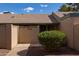 Tan colored house exterior with a walkway and landscaping at 4632 W Continental Dr, Glendale, AZ 85308