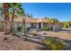 Single-story home with a desert landscape and a two-car garage at 813 W Diamond Dr, Tempe, AZ 85283